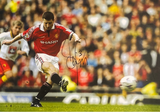 Denis Irwin Signed Classic Strike Photo Print (L)